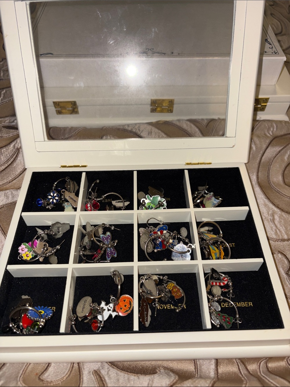 Willabee & Ward 12 Month Seasonal Pierced Earrings Preowned with Box